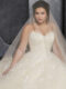 Kasmira-Plus-Size-Wedding-Dress-seated-horizontal